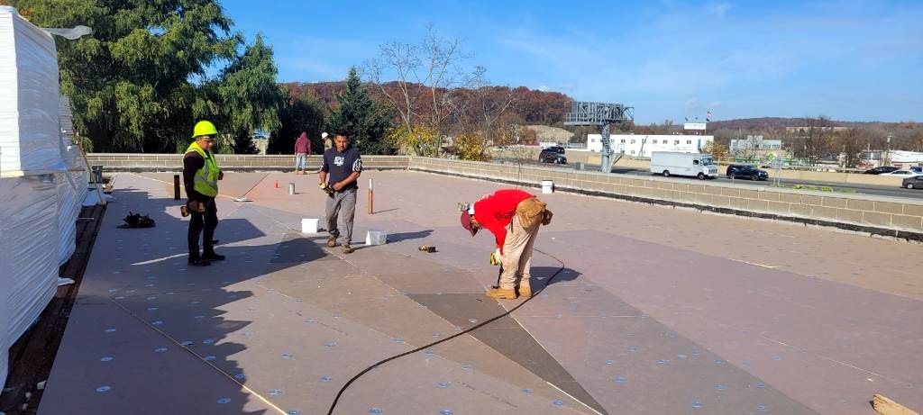 Commercial .060 EPDM flat roof installation by E.M Construction in Westchester, NY